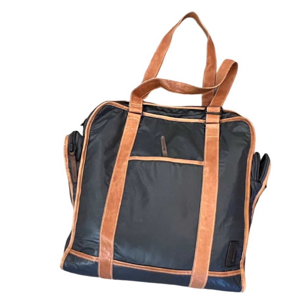 Property of leather/nylon bag